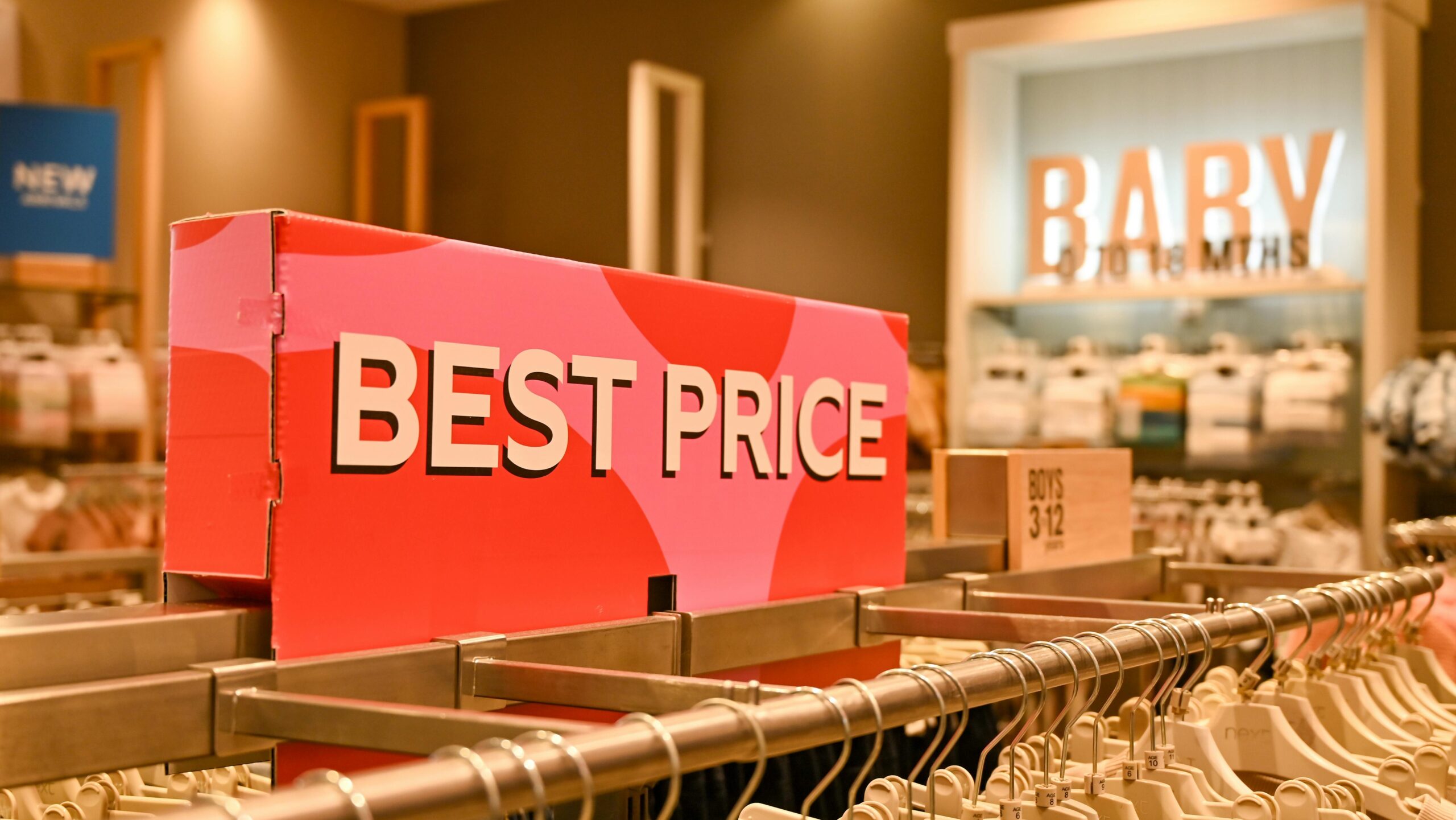 Best price text in a clothing store.